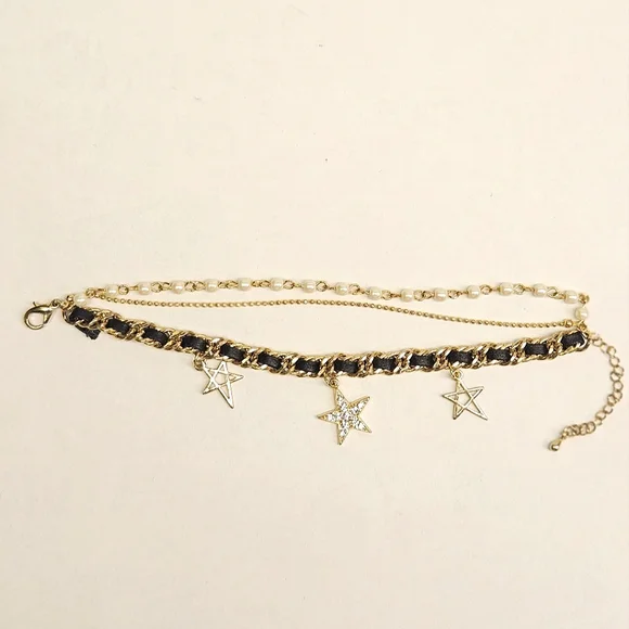 Goldtone Triple Strand Star Charm Bracelet - Picture 3 of 7